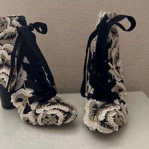 Gold, black, and white lace up boots!